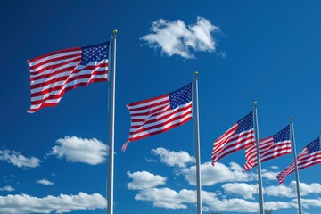 American flags blow in the wind. The stripes dance together in the celebration of liberty 