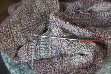 Beautiful handknit sweater, cardigan work in progress and on round knitting needles, made with pure...