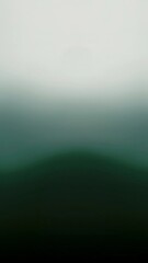 A Green and White Gradient Blur: An Abstract Background with a Rounded Shape and a Soft Texture