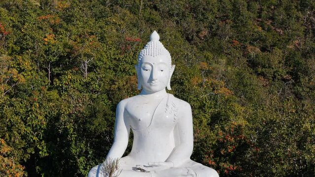 Wat Phra That Mae Yen is a temple west of Pai. Best known for a large white Buddha statue visible to the whole valley, this is a popular place to watch the sunset.