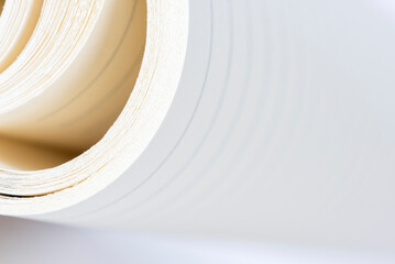 Sheets of white rolled-up paper, abstract background