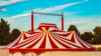 Summer view with a red and white circus tent at Landau, Isar, Bavaria, Germany