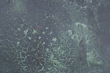 Closeup of oxidized metal surface background texture.