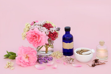 Naturopathic alternative adaptogen herbal medicine with herbs and flowers. Medicinal sedative food ingredients for healing on pink background.