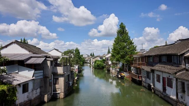 Traditional Chinese houses by the river, time lapse.