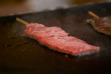 Japanese Kobe Wagyu beef at a food stall at the Tsukiji Outer Market in the city of Tokyo, Japan.