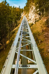 Geometric alpine summer view at the famous Highline 179 suspension bridge and the Ehrenberg castle ruins near Reutte, Tyrol, Austria