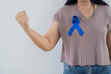 March Colorectal Cancer Awareness month, dark Blue Ribbon for supporting people living and illness.