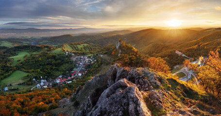 Beautiful Panoramic View of Colourful Fall Forest and Mountains in Vrsatec landscape. Sunset or Sunrise Sky Composite. Slovakia