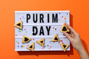 A mask with traditional cookies for the day of Purim.