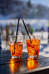 Children and adults, happy family in winter clothing at ski vacation, skiing, winter