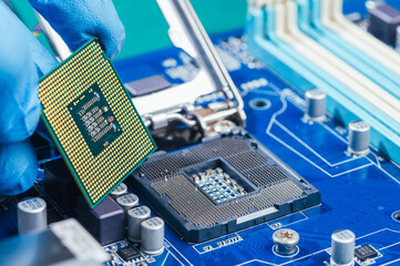 The technician repairing the computer. the concept of computer, CPU, motherboard, hardware,...