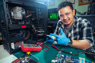The technician repairing the computer. the concept of computer, CPU, motherboard, hardware,...