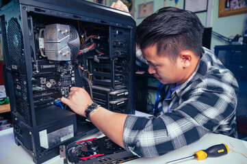 The technician repairing the computer. the concept of computer, CPU, motherboard, hardware, repairing, upgrade and technology.