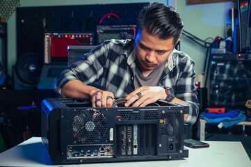 The technician repairing the computer. the concept of computer, CPU, motherboard, hardware, repairing, upgrade and technology.
