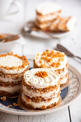 Small carrot cakes on white background