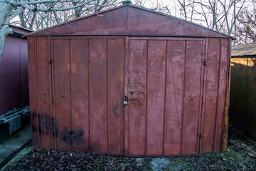 Old rusty red garage