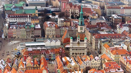 Aerial view of Poznań's historic market square in winter.
