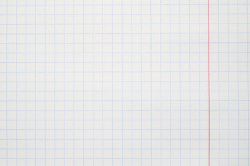 Classic Exercise book, checkered notebook isolated on a white background. Close-up.