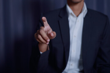 Businessman touching imaginary screen successful business idea