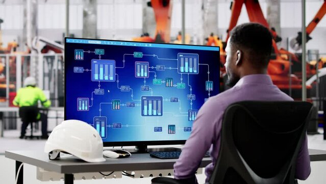 African American Engineer Using Computer