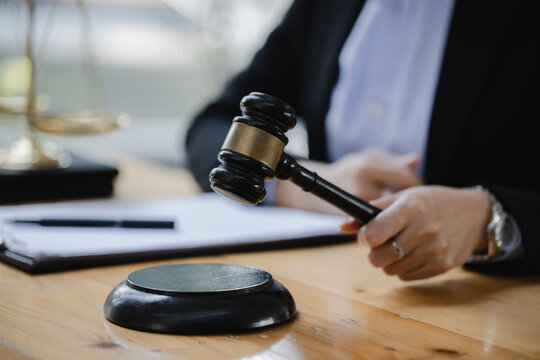 Concepts of Law and Legal services. Lawyer asian woman working at law office.