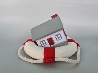 House lifebuoy and home insurance concept
