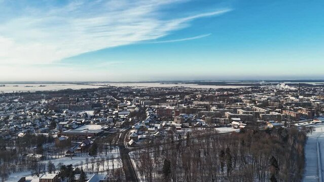 City of Silute in Lithuania in winter, Smoke fumes coming out of Industrial buildings in the city, Germany