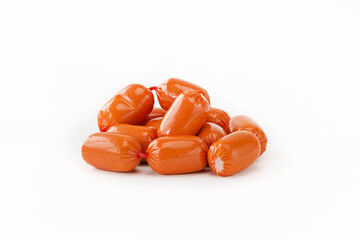 Pile of small sausages in wrapper on white background