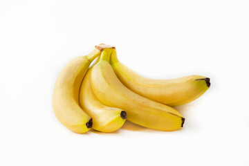 A bunch of ripe bananas on a white background. Isolated