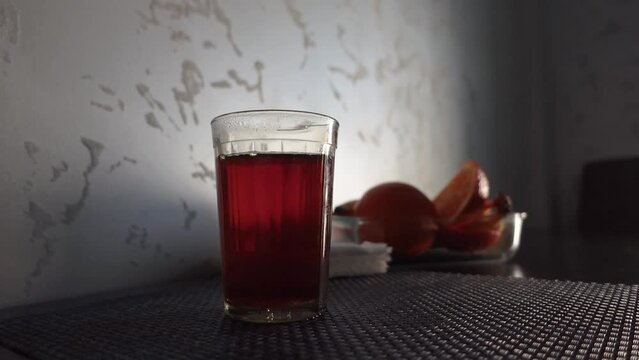 mix tea sugar. fills Turkish tea into a glass, refreshment teaspoon, liquid breakfast teatime drink, taste delicious tea. Slow Motion full HD stock footage.
