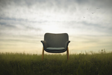 empty chair in the middle of nature, concepts of absence, loss and waiting - 737923894