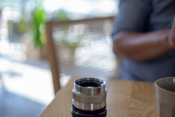 ,Close-up of hand holding camera,Close-up of camera,Close-up of hand holding camera lens,Old...