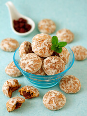 Stuffed cookies with cranberries jam.