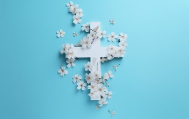 Christian cross on a light blue background, flowers and butterflies around it, space for text, minimalism