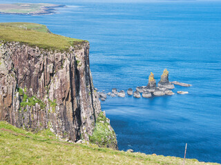 Kilt Rock on the Isle of Skye (Scotland) - cliffs with a columnar structure and small rocky islands...