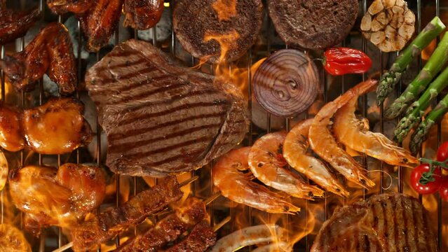 Super slow motion of mix of meats, and vegetable on grill grid. Filmed on high speed camera, 1000 fps
