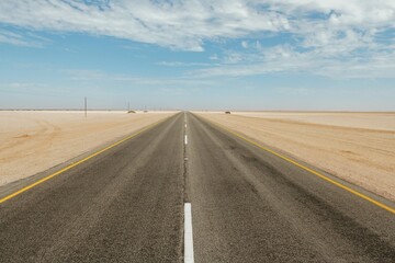 Straight surface. Majestic landscaped view of road in Africa, Namibia