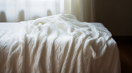 Fototapeta na wymiar Soft and white cotton blanket