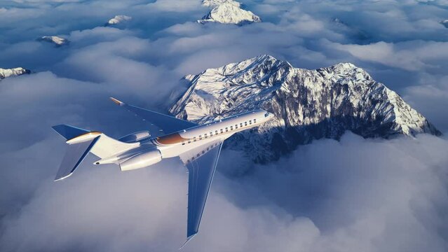 Two jet engine passenger airplane. Light weight, private aircraft flying, passing high mountains. Slow commercial flight over clouds. People transportation by air. Air to air view.