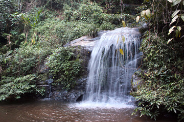 Obraz premium Monthathan Waterfall Trail, a popular trail for hiking and walking near Mueang Chiang Mai in northern Thailand.