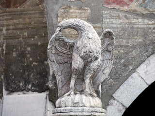 Eagle sculpture outside Facade of the Cazuffi Rella house in Duomo square, Trento, Italy