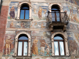 Obraz premium Facade of the Cazuffi Rella house in Duomo square, Trento, Italy