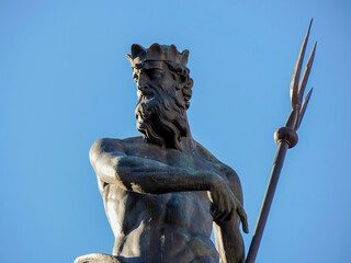 Neptune fountain in Dome place in front of the Medieval Cathedral of San Vigilio in Trento , Italy