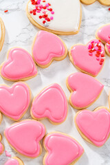 Heart-shaped sugar cookies with royal icing