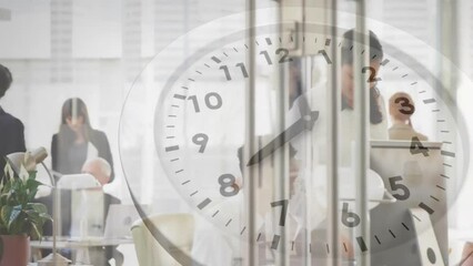 Animation of clock with fast moving hands over diverse colleagues at casual office