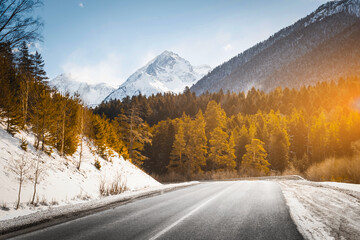 Country road in winter mountains