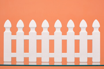 White fence. Countryside and gardening.