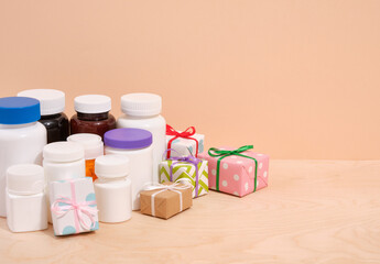 A group of medicine pills and gifts. Copy space for text. Health care.
