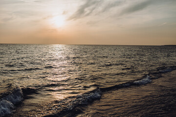 beautiful evening landscape on the sea. sunset of the setting sun. the sun disappeared behind the...